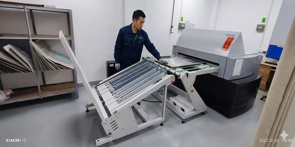 Heidelberg CTP (Computer-to-Plate) machine at Color Creative Packaging factory, producing printing plates for offset press
