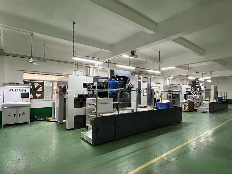 Automatic hot foil stamping machine at Color Creative Packaging, high-speed flatbed foil press for packaging finishing